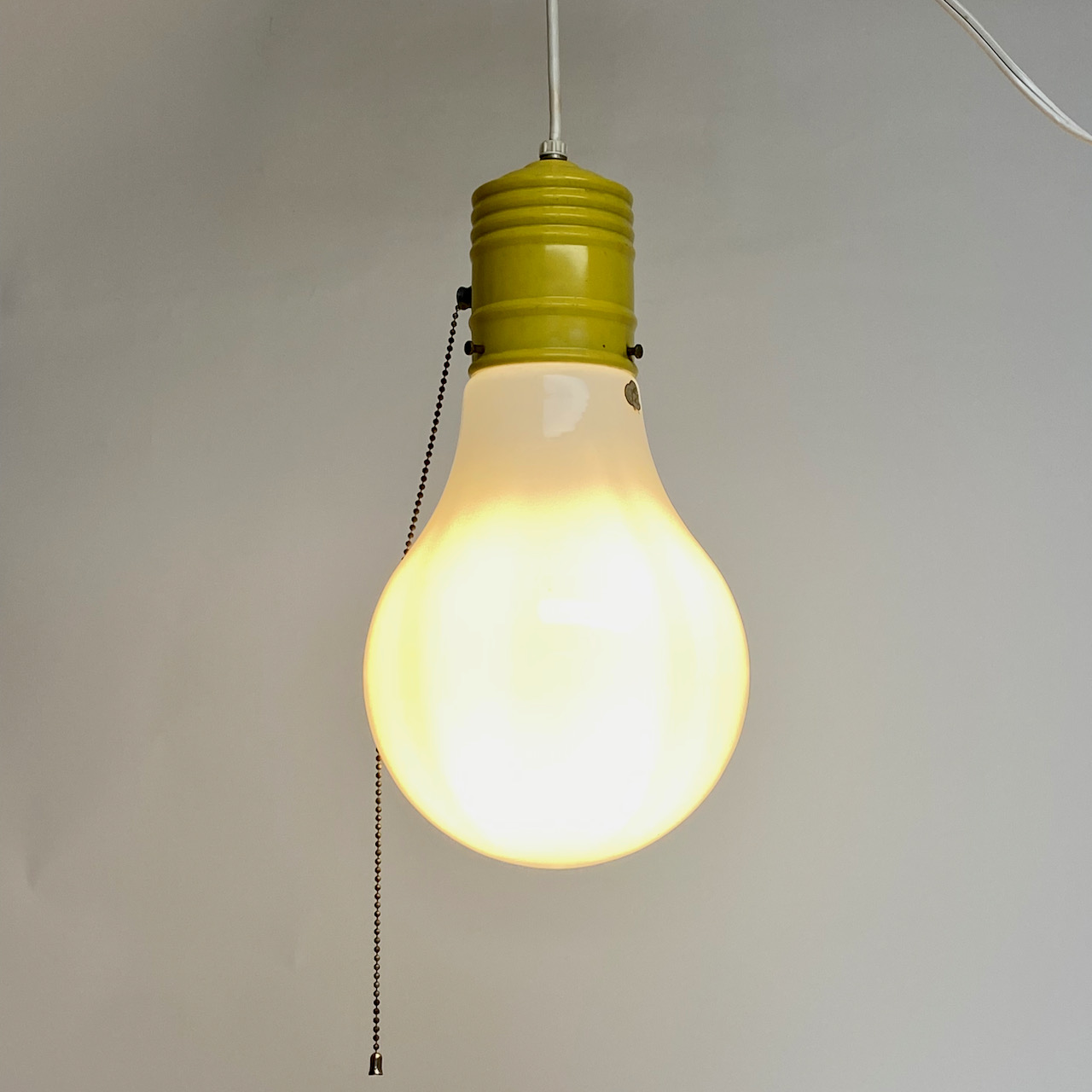 giant hanging light bulb